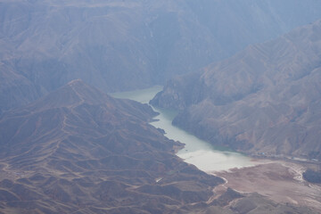 aerial view of mountains in the snow