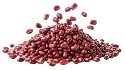 A pile of vibrant red kidney beans with some beans falling from above isolated on transparent background