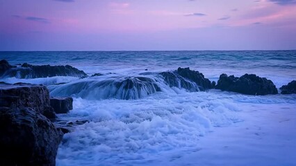 Long exposure photograph of powerful ocean waves crashing against dark rocks under a twilight sky in deep blue and purple tones, representing raw nature and dramatic beauty - Powered by Adobe