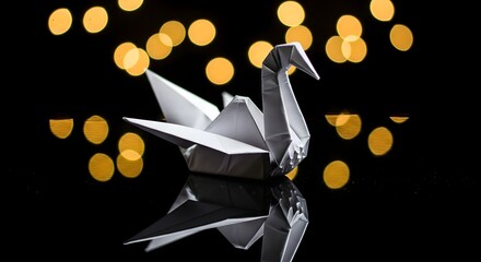 Origami swan on black reflective surface with bokeh lights in the background 90 char