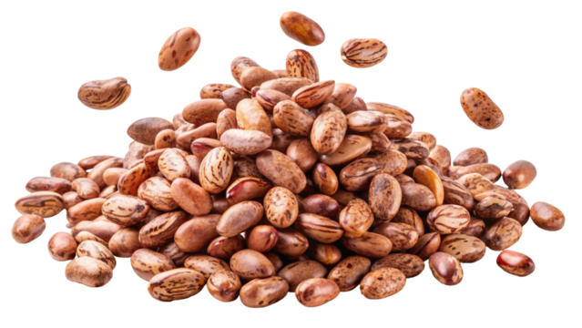 A pile of pinto beans with some beans falling and suspended in mid air isolated on transparent background