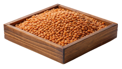 A rustic wooden box filled with small orange lentils isolated on transparent background