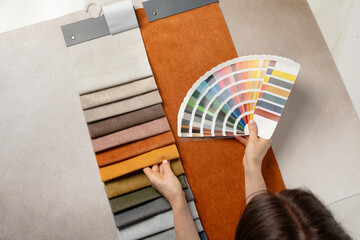 Fabric samples and color palette for custom furniture design, textile swatches for upholstery, interior decoration and creative material selection.