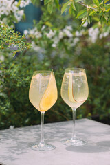 Refreshing pear spritz cocktails on an outdoor table