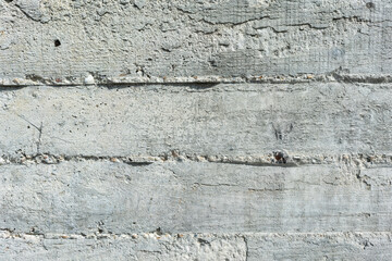 Old gray concrete wall, a beautiful background for the designer, copy empty space
