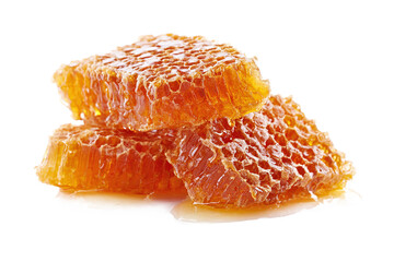 Fresh natural honeycomb with honey drips, isolated on white transparent background