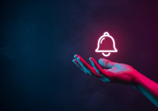 A single hand presenting a glowing notification bell icon, a simple and effective image perfect for call-to-action buttons like 'Subscribe Now' or 'Get Alerts'