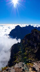 Mountain peak above clouds