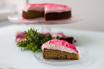 Whole cake with pink frosting for Christmas