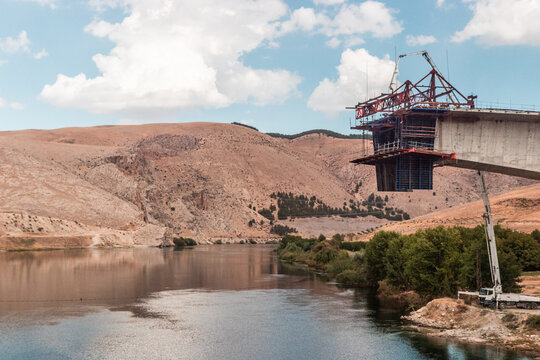 Construction of a bridge over Euphrates (Firat) river under the Ataturk dam, Turkey