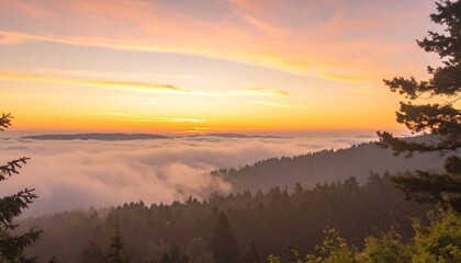 Panoramic sunrise over misty mountains