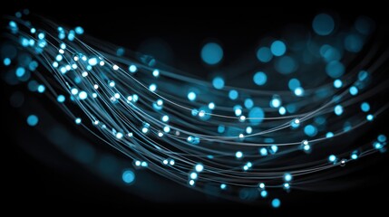 Dynamic blue light trails create an abstract design on a dark background
