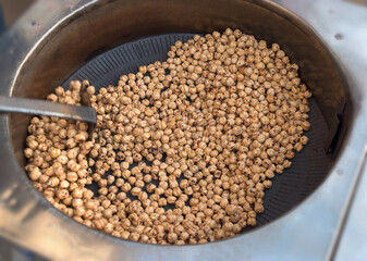 Traditional roasted chickpeas in a pan.