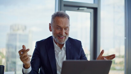 Creative manager talking virtual conference showing agreement in webcam closeup.