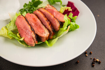 Duck breast roast poultry fresh natural product tasty snack delicious gourmet food background on the table rustic top view copy space