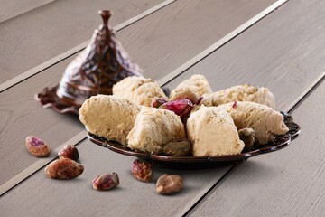 Traditional plate with sweet date fruits and tea