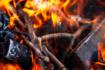 Burning wood and fire flames. Empty hot charcoal barbecue grill with bright flame