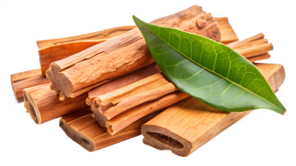 Pile of sandalwood sticks with a green leaf isolated on transparent background, showcasing the aromatic wood used in perfumes and incense making