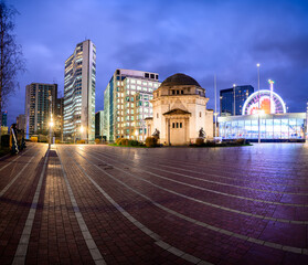 Night View of Centenary Square Birmingham with Monuments, Modern Buildings, and Bright Ferris Wheel
