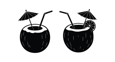 Two black and white coconut drinks with umbrellas and citrus slices