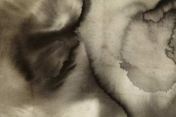 Abstract background of India ink runs and blooms on paper 