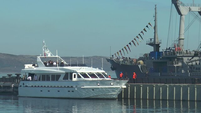 SEVEROMORSK, RUSSIA - July 29, 2013. Day of the Navy. The boat of commander of the fleet at the pier.