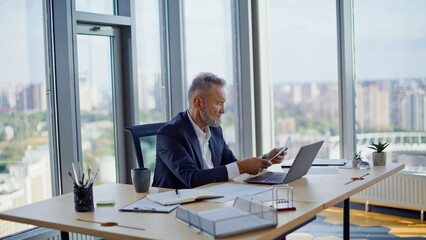 Nervous investor throwing papers finding mistake in documentation at workplace.