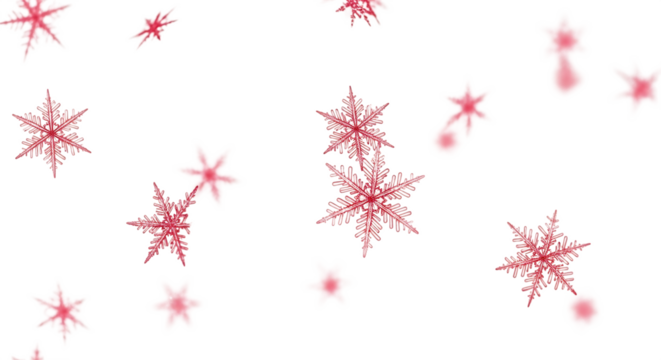 Delicate red snowflakes falling gently isolated on transparent background, creating a wintery scene