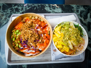 Colorful Poke Bowl Served on a Table with Fresh Ingredients