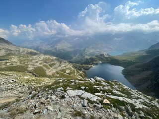Panoramic view of the Nivolet Lakes, located in the Gran Paradiso National Park between Piedmont and Aosta Valley, Italy. The scene features two alpine lakes &mdash; Lago Serr&ugrave; and Lago Agnel