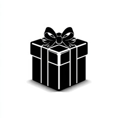 Obraz premium Decorative black gift box with a bow on top ideal for celebrations and special occasions