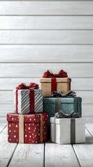 Gift boxes in festive colors arranged on a wooden surface for holiday celebrations
