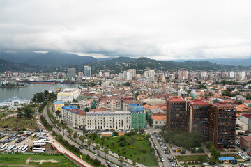 View over Batumi and Black Sea surrounded by Lesser Caucasus mountain in summer. Adjara Region, Georgia.