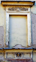 Old sealed window on the 19 century building.