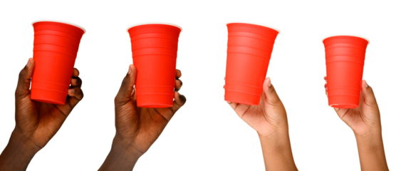 Four hands holding red plastic cups, isolated on a transparent background.
