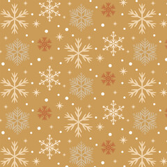 A simple seamless pattern with snowflakes and stars on a brown background for winter holiday wrapping paper or fabric print.