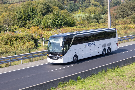 Monbus setra coach traveling on a highway