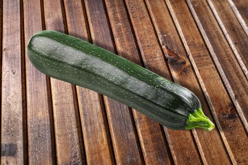 Ripe green fresh zucchini vegetable