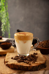 Dalgona Coffee, a cold, sweetened whipped beverage made with milk and frothy coffee cream made with instant coffee, a trendy, refreshing, and easy recipe.