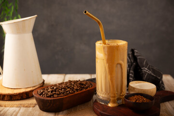 Dalgona Coffee, a cold, sweetened whipped beverage made with milk and frothy coffee cream made with instant coffee, a trendy, refreshing, and easy recipe.