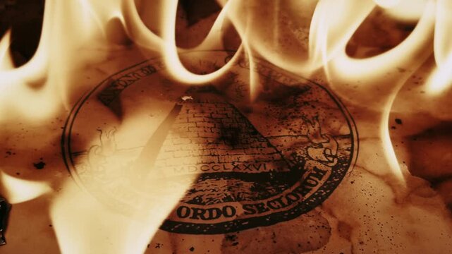 The Eye of Providence Illuminati Symbol on Parchment in Flames