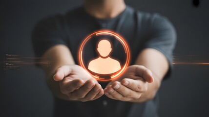 Man holding glowing silhouette of a person in his hands