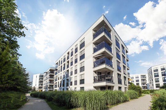 Residential area with ecological and sustainable green residential buildings, low-energy houses with modern apartments, new green urban landscape in the city