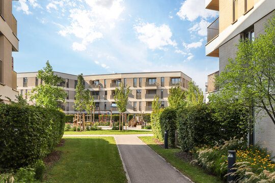 Residential area with ecological and sustainable green residential buildings, low-energy houses with modern apartments, new green urban landscape in the city