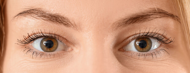 Young woman with beautiful eyes, closeup