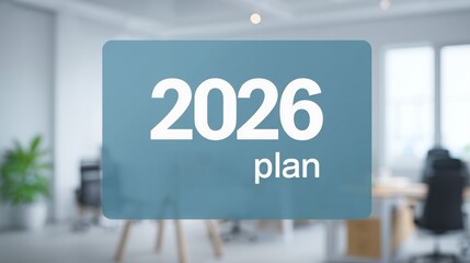 startup growth 2026 Sign displaying "2026 plan" in an office setting, emphasizing future planning and strategy.