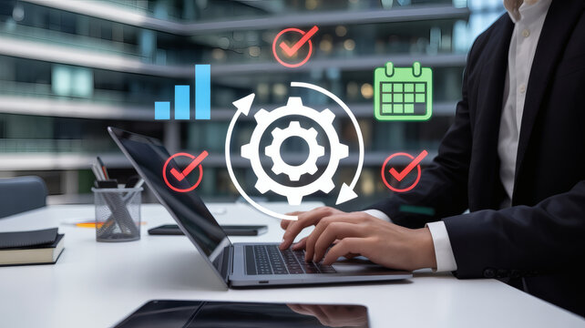 Business professional using a laptop with digital icons representing workflow automation project management and business analytics in a modern office - Powered by Adobe