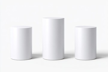 Three white cylindrical display pedestals of varying heights, against a plain white background