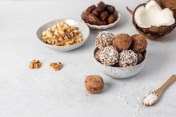 Homemade vegan healthy sugar-free candies made from dried fruits and nuts. Healthy eating.