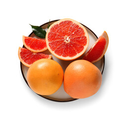 Plate with fresh ripe grapefruits on white background